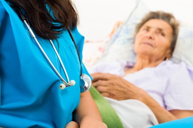 elder person in hospital bed