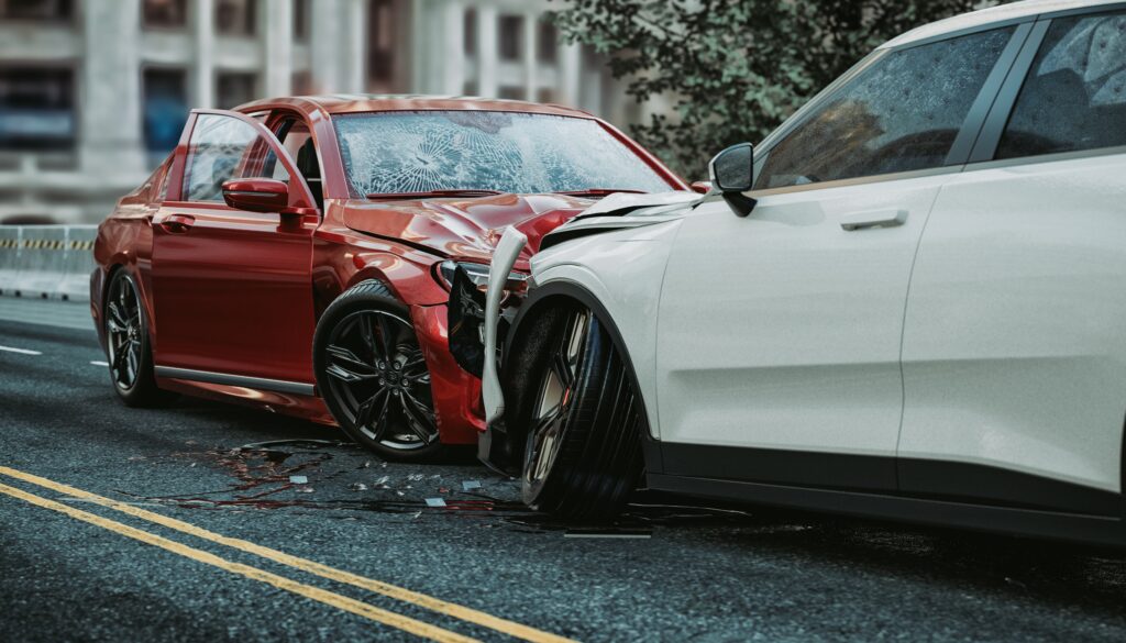 red and white cars crashed in a road